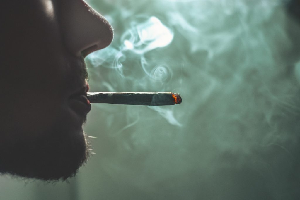 Man smoking cannabis as gateway drug