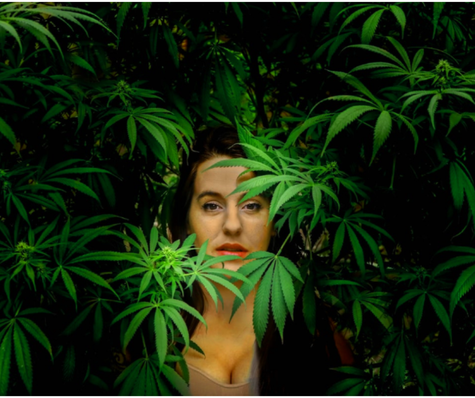 girl in weed bush
