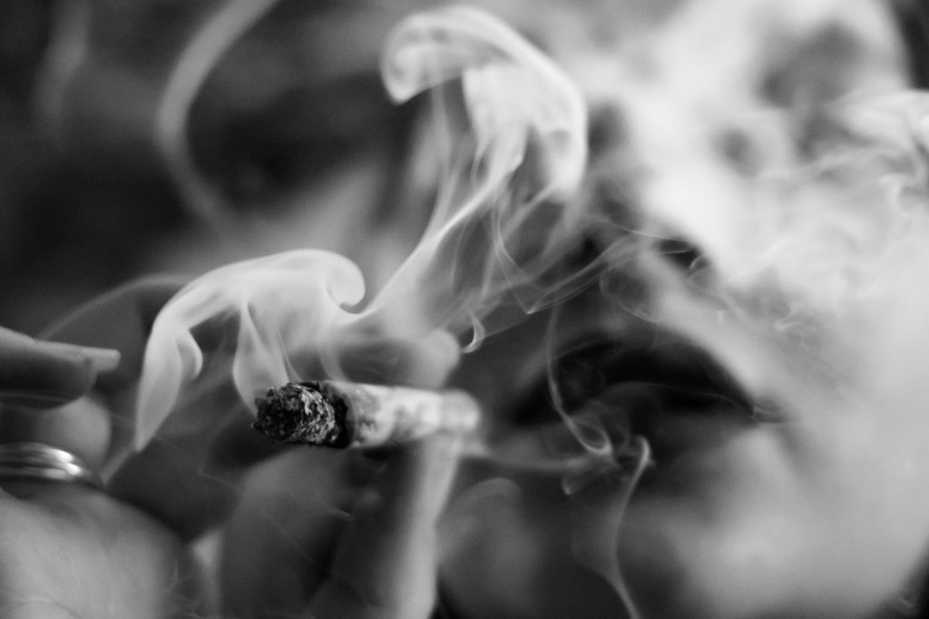 Woman smoking cannabis and motherhood